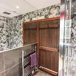 בית נופש The Curious Orange ווינדרמר